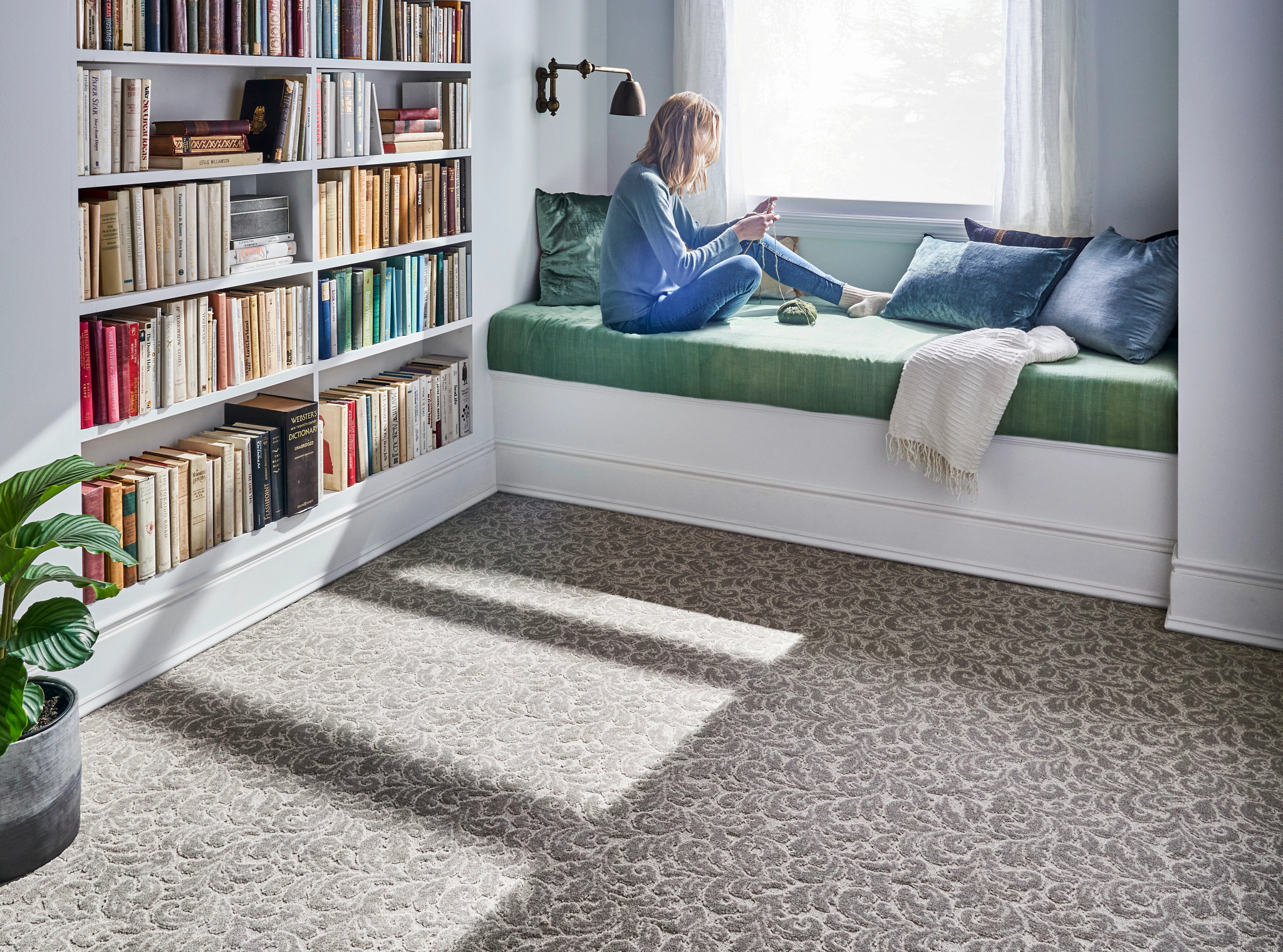 playroom reading nook woman reading cozy carpet
